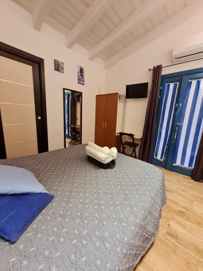 Portopollo Surfhouse Barrabisa Eksteriør bilde